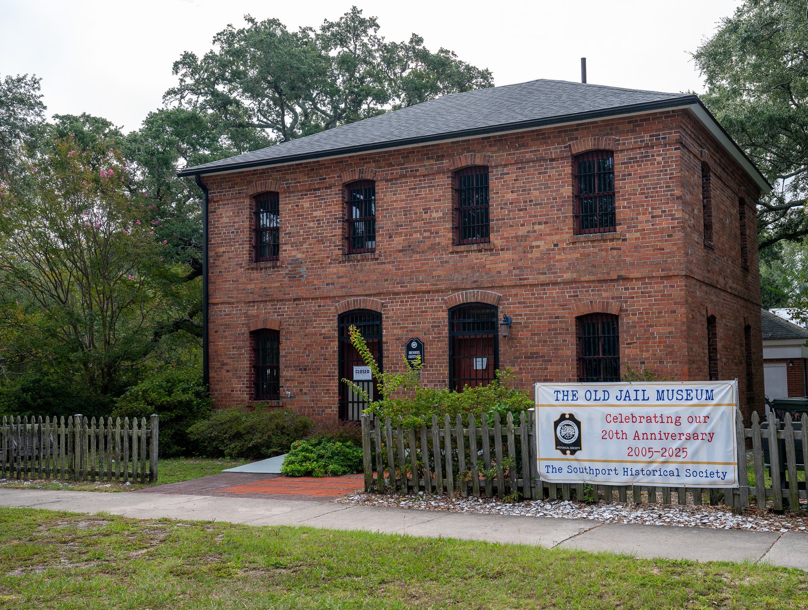 Old Jail Museum with anniversary banner