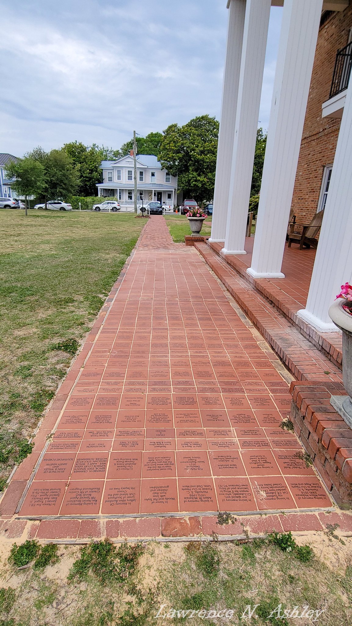 Walkway of engraved commemorative bricks
